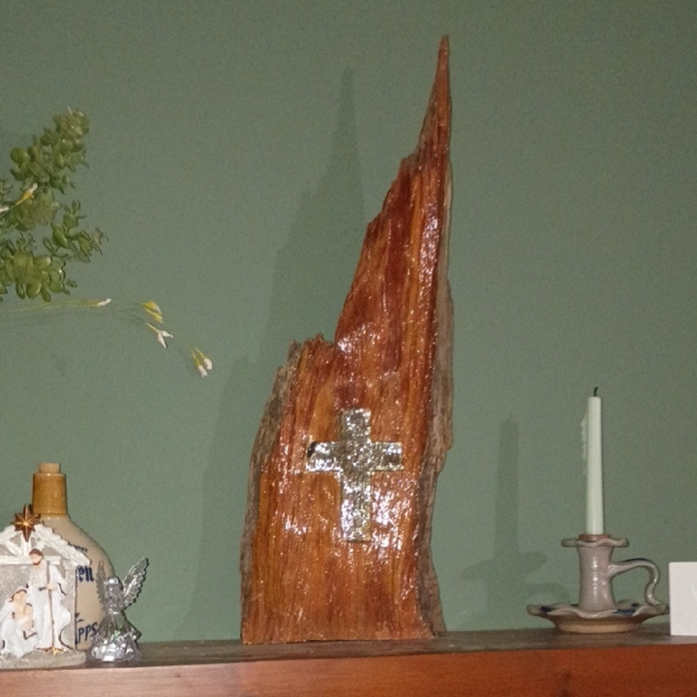 Elegant Wooden Sculpture with Silver Cross